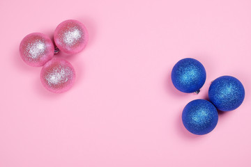 Glitter pink and blue spheres on trendy background.