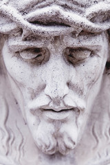 Fototapeta premium Antique statue of Jesus Christ crown of thorns. Religion concept.