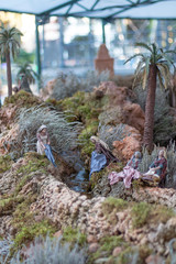 Native scene: woman at river.