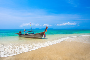 Naklejka na ściany i meble Long tail boat on tropical beach, Krabi, Thailand