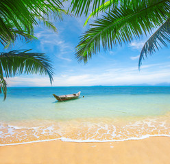 Obrazy na Szkle  tropikalna plaża z palmami kokosowymi