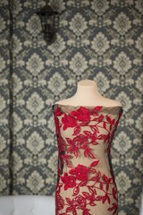 Red lace stock photo on dummy, mannequin