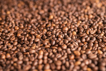 Coffee beans heap close up