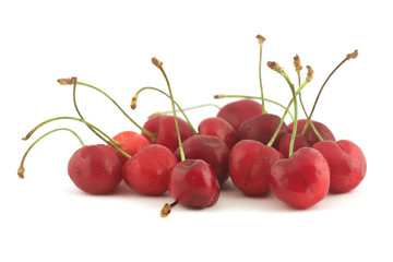 Obraz na płótnie Canvas red cherries on white background