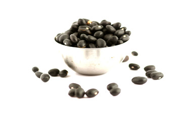 black beans in a bowl isolated on white background