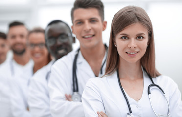 Fototapeta premium doctors team showing finger in camera