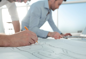 close up.architects make sketches for a new project