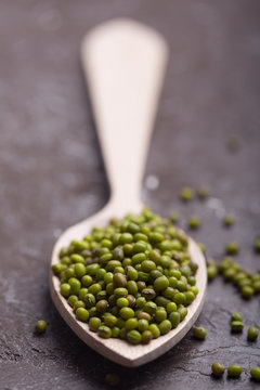 Green soy beans on the dark background