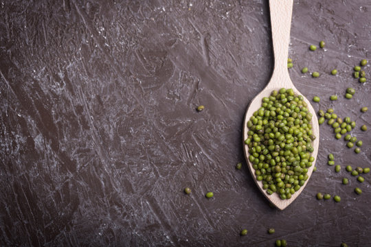 Green soy beans on the dark background