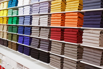Colorful shirts insade fashion store shelves