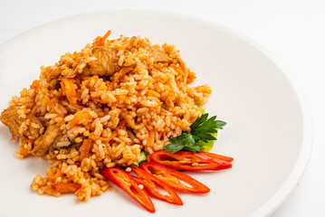rice pilaf with meat, carrot and onion isolated on white background