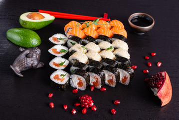 sushi on the black background