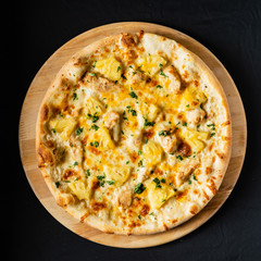 pizza on the black background