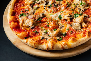pizza on the black background