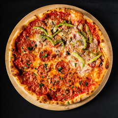 pizza on the black background