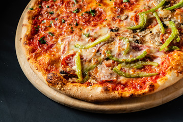 pizza on the black background