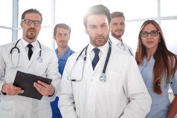 Young doctors looking at camera