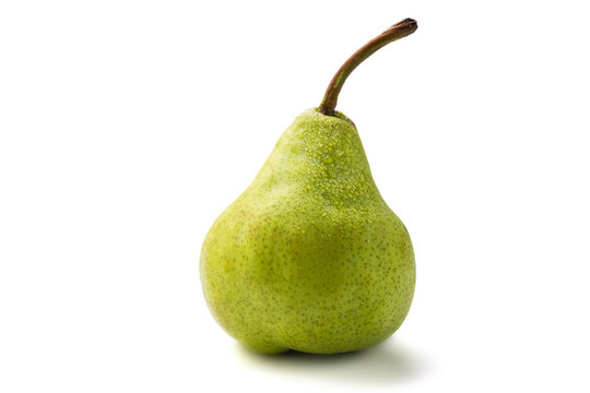 Juicy green packham pear on white with drops.