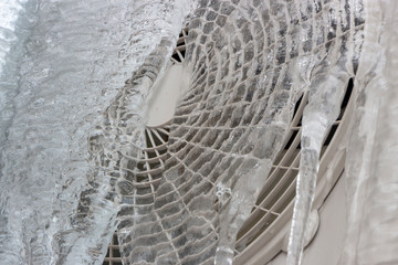 icicles hanging from the air conditioner close-up