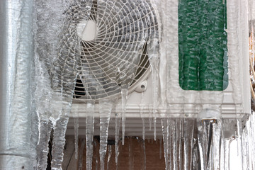 icicles hanging from the air conditioner close-up