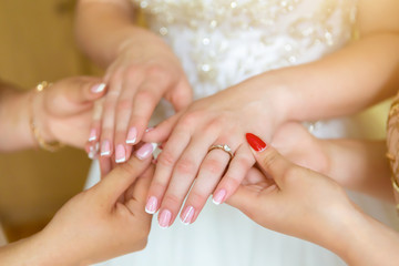 Obraz na płótnie Canvas bride's manicure.Hands of bride place for text