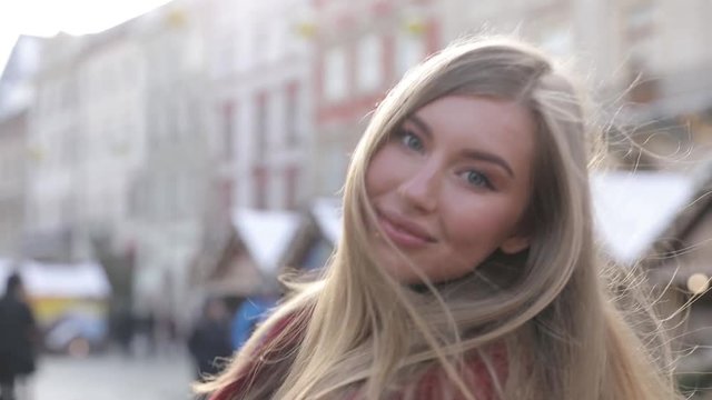 Beautiful girls makes picture in european city.