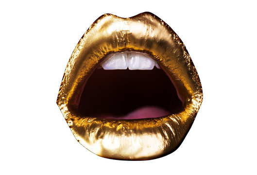 Sexy gold. Luxury lips make-up. Golden lips with creative lipstick. Gold paint on lips and white teeth of young girl. Sexy woman with emotions female open mouth isolated on white background.