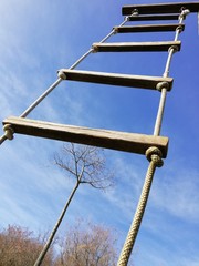 ladder on blue sky,safe way to the top,path to success