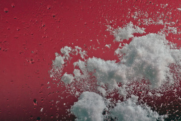 glass snow red background 