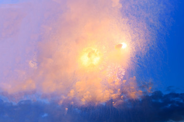 Celebratory fireworks in night time smoky closeup, concept celebration, festival, fun