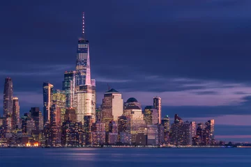 Fotobehang Financial district  view from hudson river at night with long exposure © Andriy Stefanyshyn