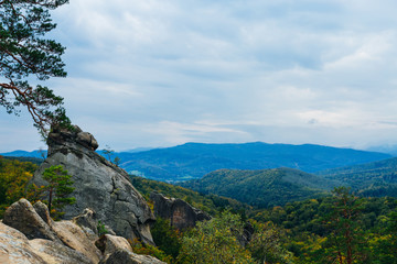 A magnificent view of the mountains and the sky with clouds. in