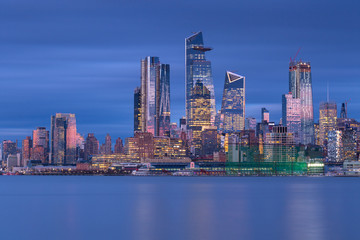 Fototapeta na wymiar Midtown Manhattan view at night from Hudson river with long exposure