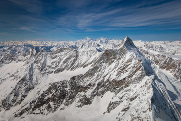 Aerial view of landscape in the Italian and French alps with Mont Blanc .