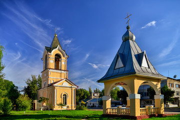 Fototapeta na wymiar Reni. Ukraine. September 22, 2013. The bell tower of the Holy Ascension Cathedral. Against the background of blue sky with cirrus clouds.