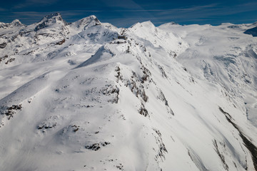 Fototapeta na wymiar Aerial view of Gornergrat with Observatory in the Swiss ski region of Zermatt.