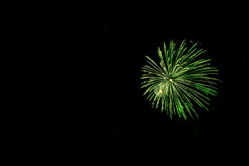 Green fireworks with copy space