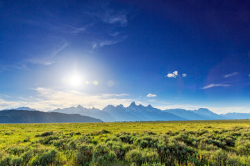 Sunburst Above the Mountain Range