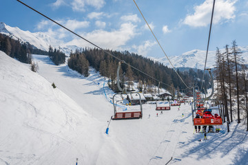 Fototapeta na wymiar Ski lift in the alps, Italy