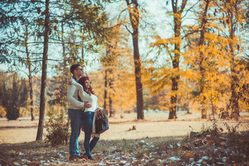 Two people in love admiring the view of the wood