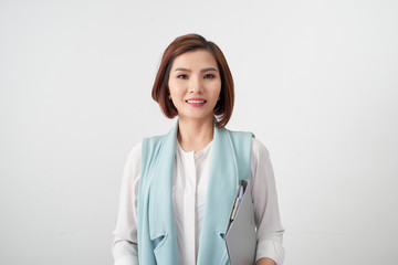 elegant business woman with clipboard on light office background