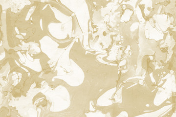 Luxury gold marble ink paper texture on dark watercolor background. Chaotic abstract organic design. Bath bomb waves.