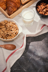 Breakfast with toast and croissant. milk in a glass bottle. Good start to the day. Good morning