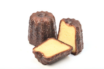 French confectiony, Canele cake on white background  