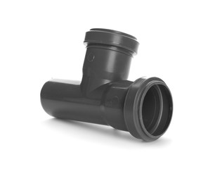 New pipe fitting on white background. Plumber's supply
