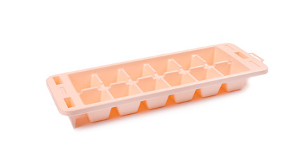 Empty ice cube tray on white background