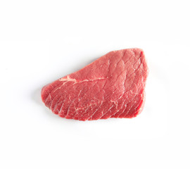 Piece of raw beef on white background, top view. Natural food high in protein