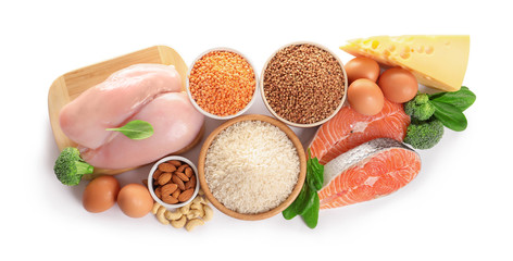 Set of natural food high in protein on white background, top view