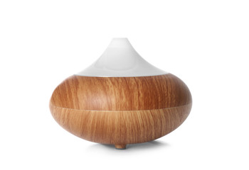 Aroma oil diffuser lamp on white background