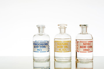 The three common mineral acids used in chemistry, hydrochloric, sulfuric and nitric.